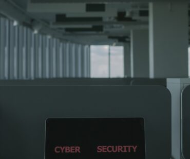 Free Laptop With Cyber Security Text on the Screen Stock Photo