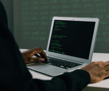 Free Person Using Macbook Air Stock Photo