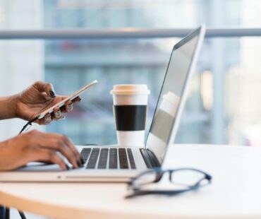 Free laptop on table top stock photo